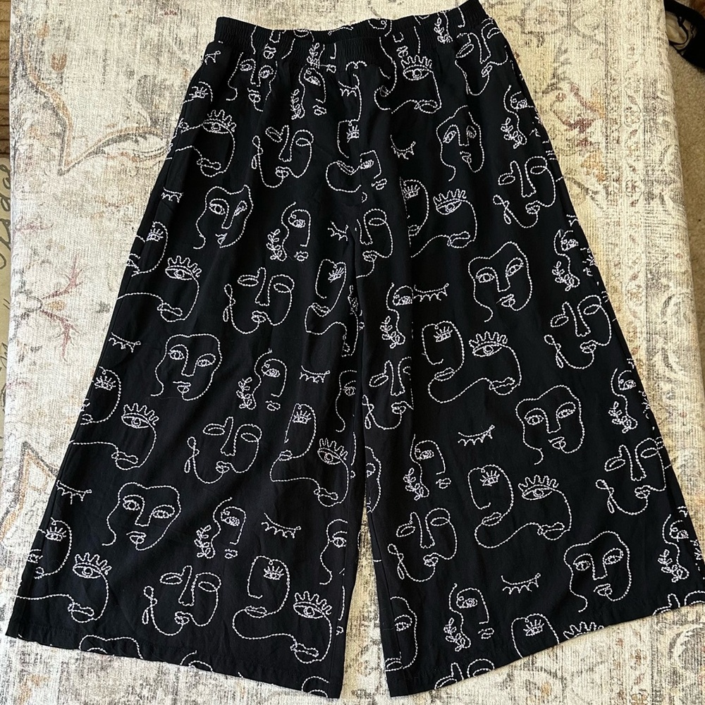 Abstract Face Embroidered Wide Leg Pants